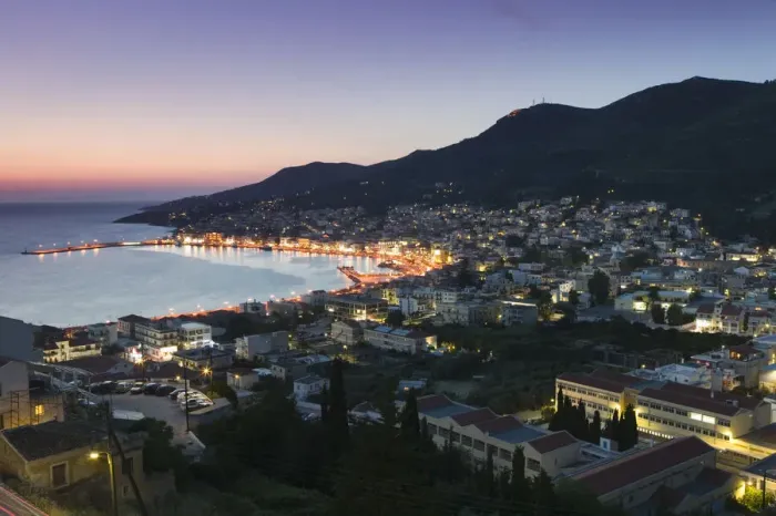 Framed Print : Greece, Samos, Vathy, harbour illuminated at dusk, elevated view Framed Print : Greece, Samos, Vathy, harbour illuminated at dusk, elevated view