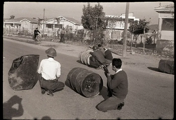 Framed Print : Greek Solders Duck Behind Barrels with Rifles Framed Print : Greek Solders Duck Behind Barrels with Rifles