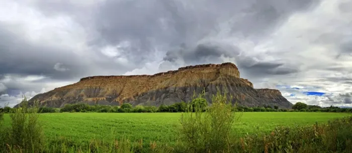 Framed Print : Green fertile valley with the South Caineville Mesa after a thunderstorm, Caineville, Utah, United States Framed Print : Green fertile valley with the South Caineville Mesa after a thunderstorm, Caineville, Utah, United States