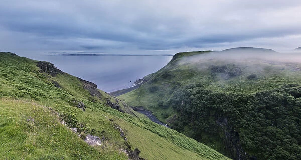 Green hills near the ocean on Isle of Skye in mist - Isle of Skye Scotland