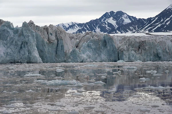 Green shimmering glacier front of Kongsbreen, Kongsfjorden, Ny-Alesund, Spitsbergen Island, Svalbard Archipelago, Svalbard and Jan Mayen, Norway