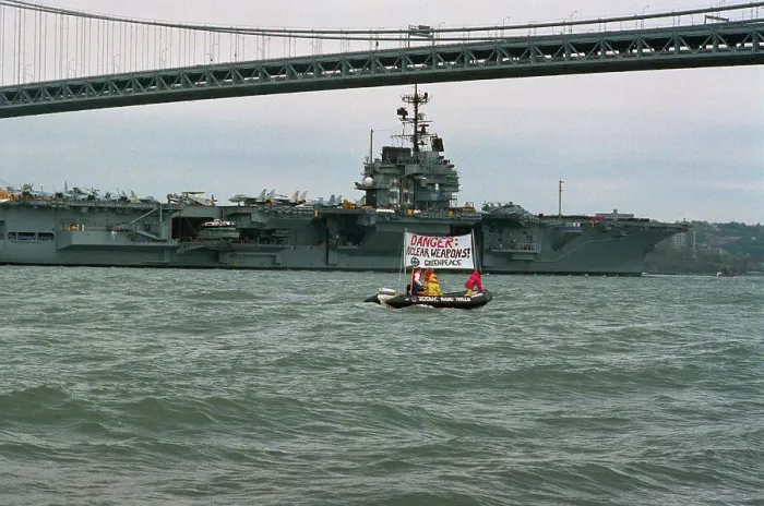 Framed Print : Greenpeace Activists Displaying Banner from Watercraft