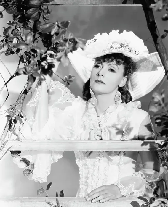 Framed Print : Greta Garbo In Lacy Dress By A Fence;Mov Framed Print : Greta Garbo In Lacy Dress By A Fence;Mov