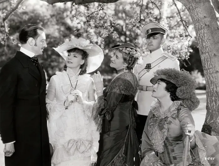 Framed Print : Greta Garbo Talking with Fellow Actors Framed Print : Greta Garbo Talking with Fellow Actors