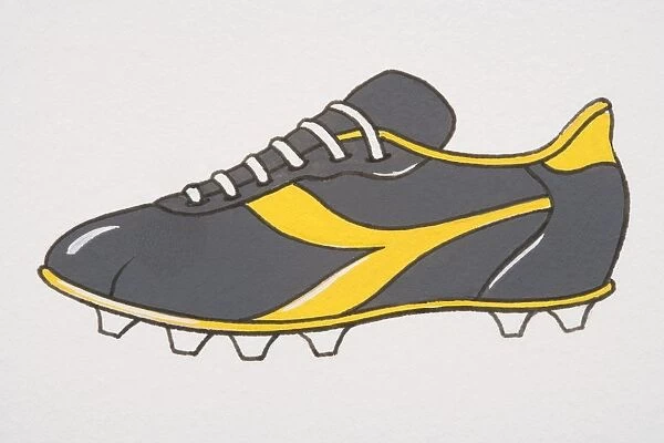 Grey and yellow football boot, side view
