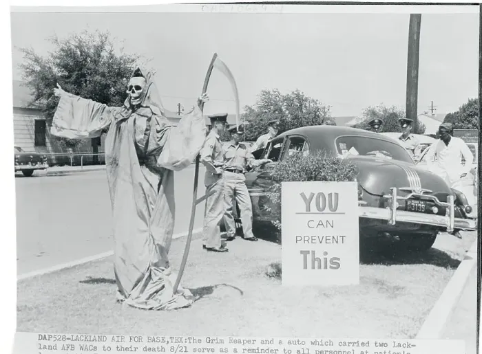 Framed Print : The Grim Reaper Standing Next to a Car Framed Print : The Grim Reaper Standing Next to a Car
