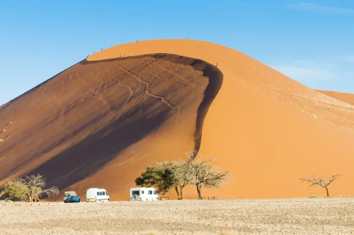Framed Print : Ground view of the world famous Dune 45 with tourists. Sossuvlei, Namibia