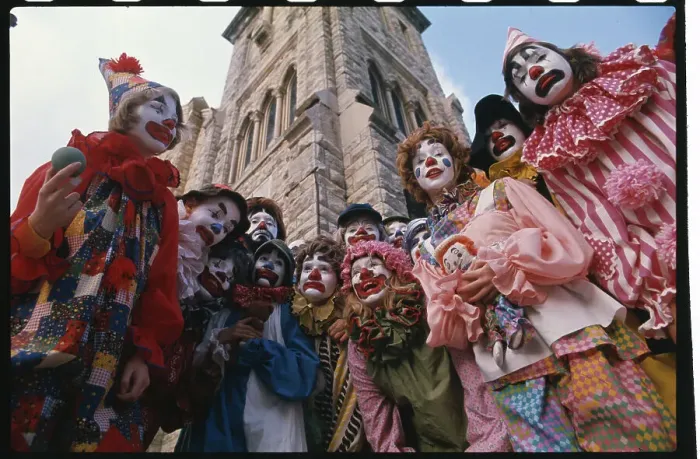Framed Print : Group of Clowns Standing Outside a Church Framed Print : Group of Clowns Standing Outside a Church
