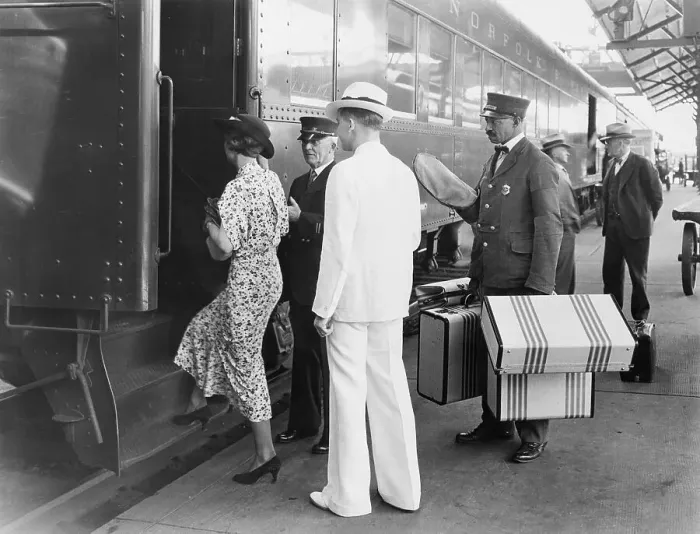 Framed Print : Group Os Passengers Boarding Train