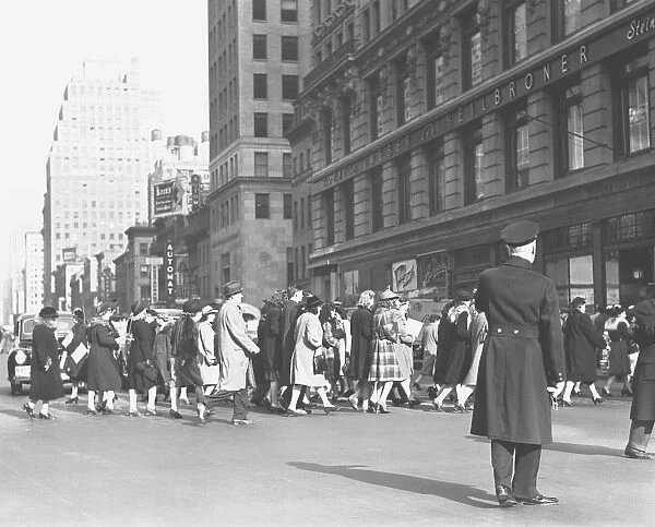 Group of people crossing street, (B&W)