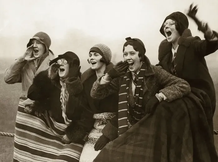Framed Print : GROUP OF WOMEN SPECTATORS CHEERING, WRAPPED IN BLANKETS Framed Print : GROUP OF WOMEN SPECTATORS CHEERING, WRAPPED IN BLANKETS