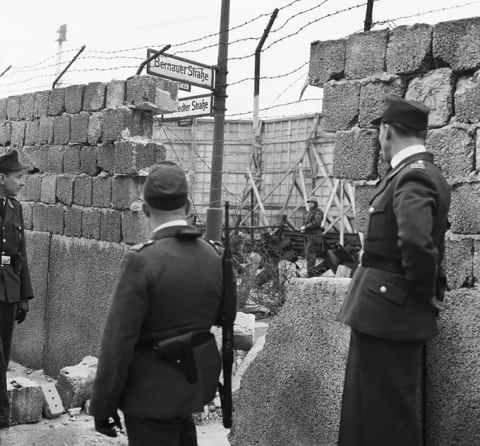 Framed Print : Guards Look Through Hole In Berlin Wall Framed Print : Guards Look Through Hole In Berlin Wall