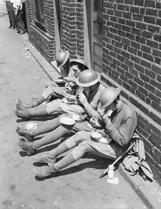 Framed Print : Guards Sit At Wall Eating Lunch Framed Print : Guards Sit At Wall Eating Lunch