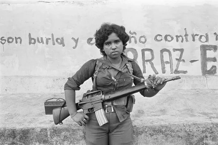 Framed Print : Guerrilla Woman With Gun Stands Guard Framed Print : Guerrilla Woman With Gun Stands Guard