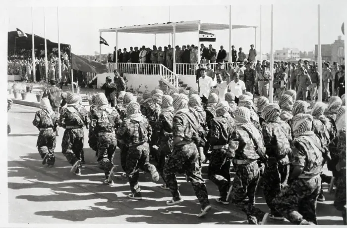 Framed Print : Guerrillas Run Past Review Stand at Parade Framed Print : Guerrillas Run Past Review Stand at Parade