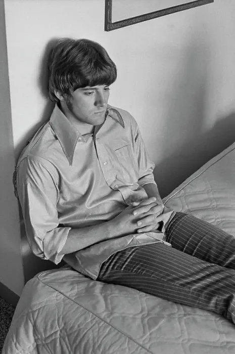 Framed Print : Guitarist. A musician sitting on a bed, USA, circa 1968 Framed Print : Guitarist. A musician sitting on a bed, USA, circa 1968