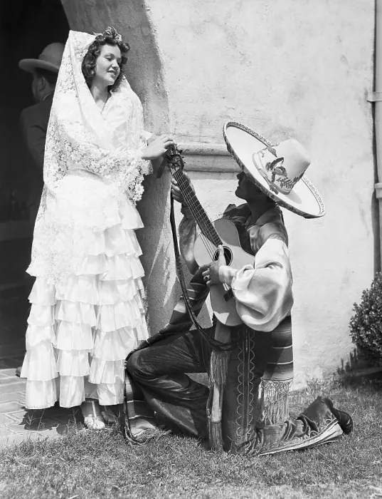 Framed Print : Guitarist Serenading Young Woman Framed Print : Guitarist Serenading Young Woman