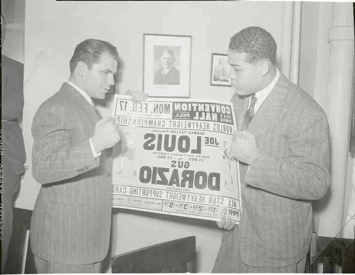 Framed Print : Gus Dorazio and Joe Louis Holding Poster Framed Print : Gus Dorazio and Joe Louis Holding Poster