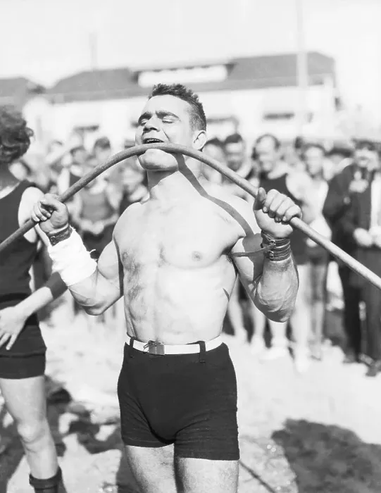 Framed Print : Gus Lasser Bending Pipe With Mouth