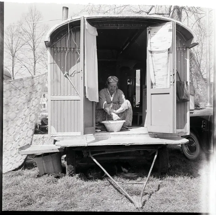 Framed Print : Gypsy Woman Bathes in Wagon Doorway Framed Print : Gypsy Woman Bathes in Wagon Doorway