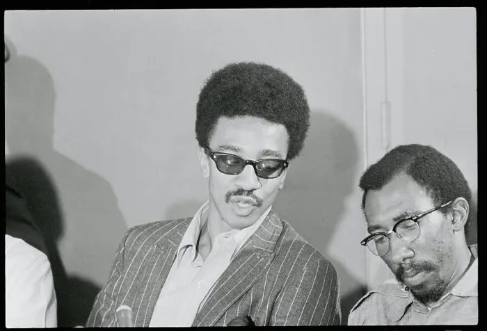 Framed Print : H. Rap Brown Speaking to a Colleague Framed Print : H. Rap Brown Speaking to a Colleague