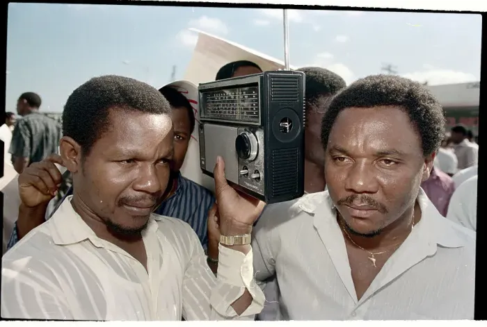 Framed Print : Haitians Listening to Radio Framed Print : Haitians Listening to Radio