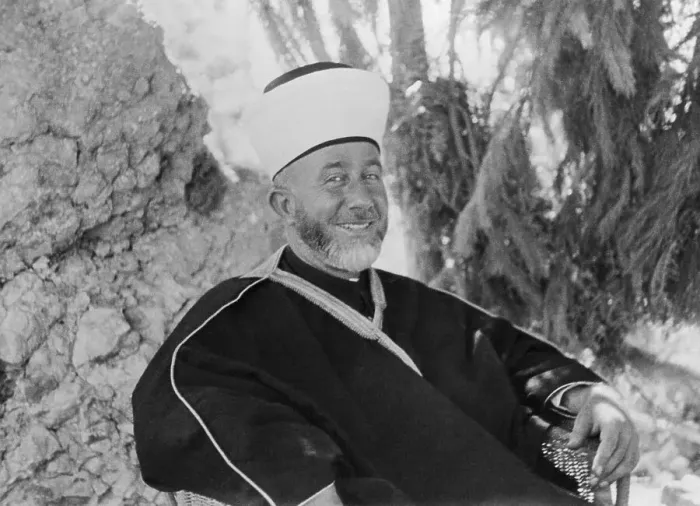 Framed Print : Haj Amim Effendi Al Husseini Sitting by Tree Outdoors