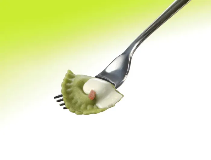 Framed Print : Ham raviolo on a fork, stuffed pasta Framed Print : Ham raviolo on a fork, stuffed pasta