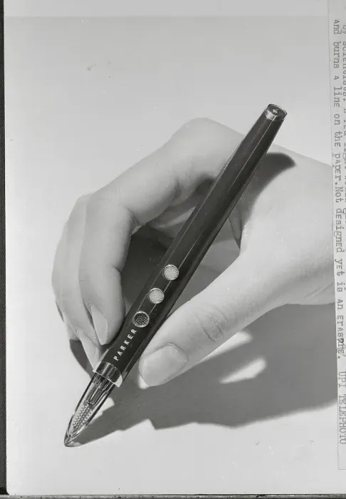 Framed Print : Hand Displaying the Conceptual Atomic Pen Framed Print : Hand Displaying the Conceptual Atomic Pen