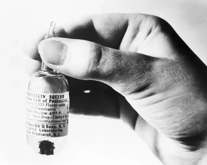 Framed Print : Hand Holding Ampoule of Penicillin Framed Print : Hand Holding Ampoule of Penicillin