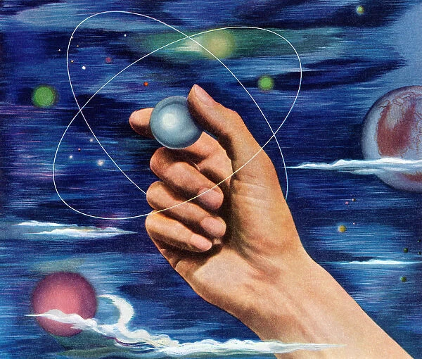 Hand holding an Planet
