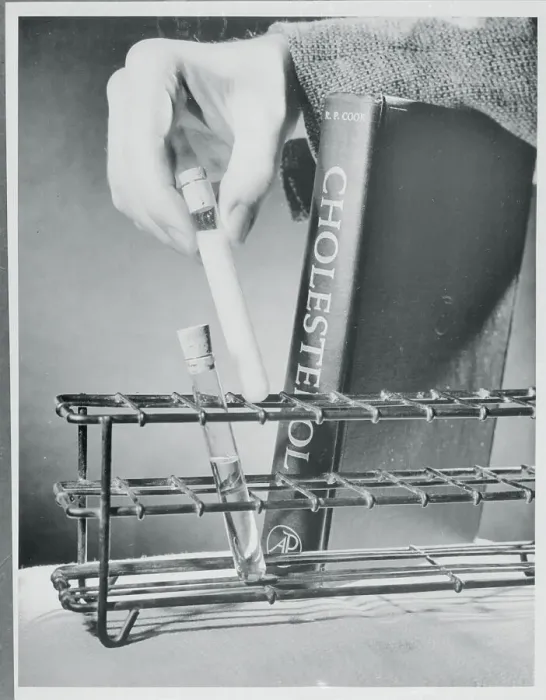 Framed Print : Hand Holding Test Tube Framed Print : Hand Holding Test Tube