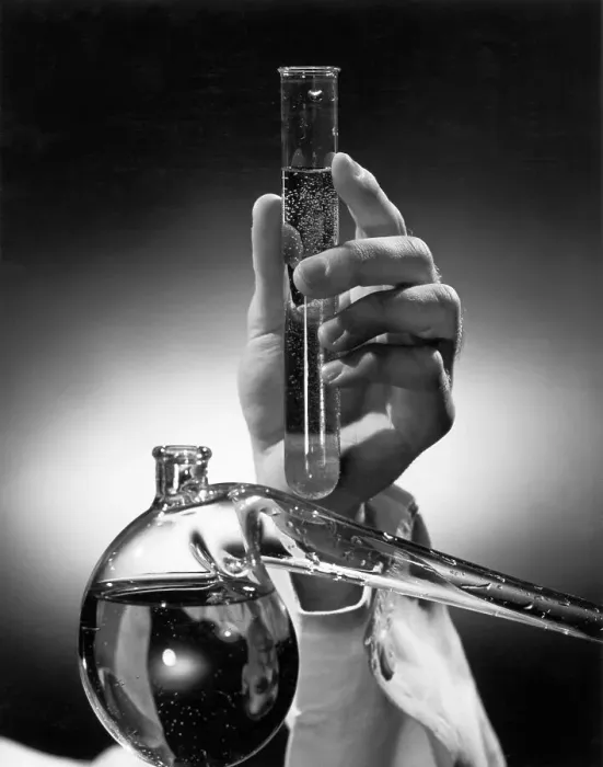 Framed Print : Hand Holding Test Tube