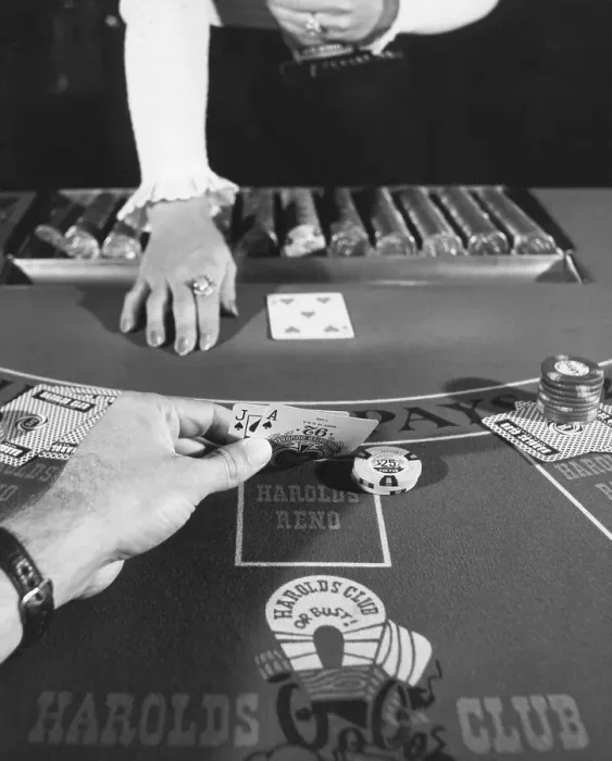 Framed Print : Hand Looking at Cards on Blackjack Table Framed Print : Hand Looking at Cards on Blackjack Table