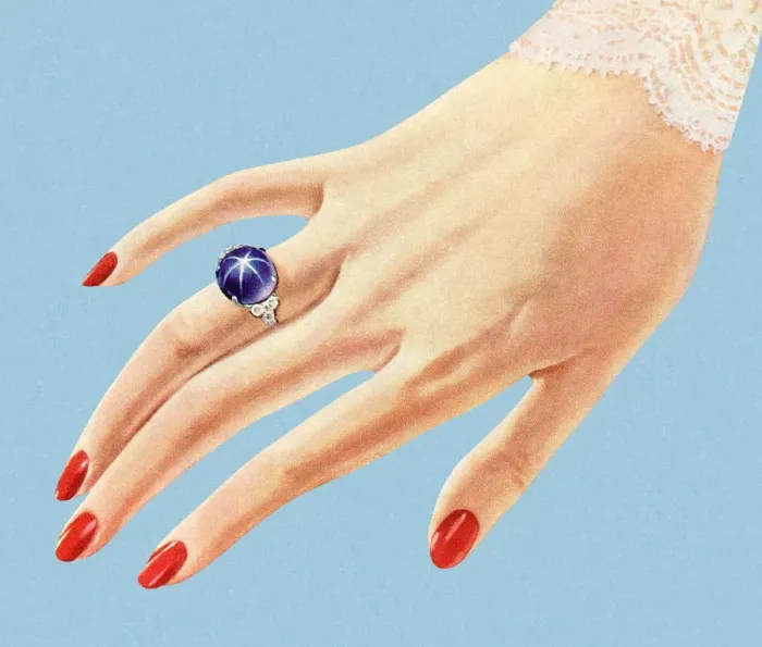 Framed Print : Hand Showing Off a Pretty Blue Ring Framed Print : Hand Showing Off a Pretty Blue Ring