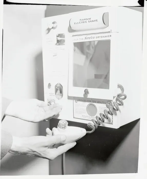 Framed Print : Hands Gripping Part of Shaving Machinery Framed Print : Hands Gripping Part of Shaving Machinery