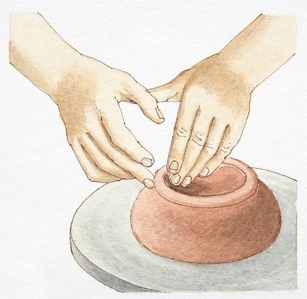 Hands molding clay on wheel