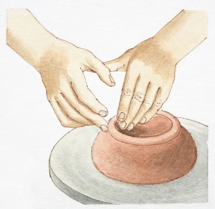 Framed Print : Hands molding clay on wheel