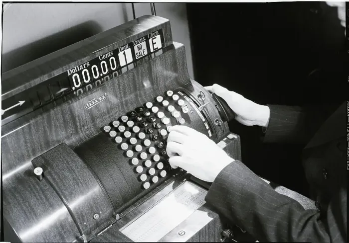 Framed Print : Hands Pushing Buttons On A Cash Register Framed Print : Hands Pushing Buttons On A Cash Register