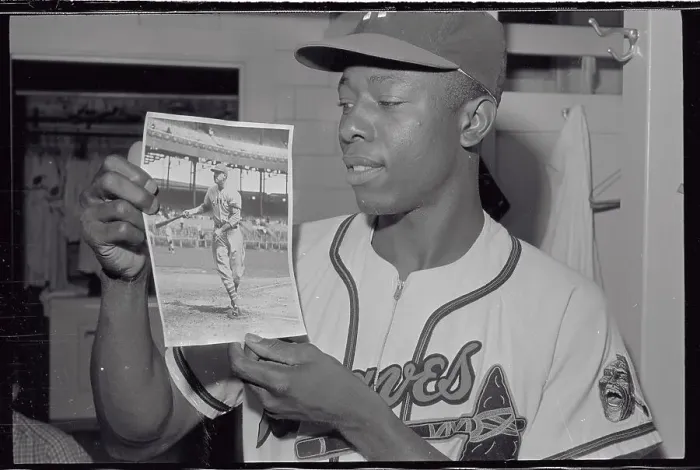 Framed Print : Hank Aaron Holding 1930 Photograph of Bill Terry Framed Print : Hank Aaron Holding 1930 Photograph of Bill Terry