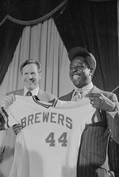 Framed Print : Hank Aaron Holding Baseball Jersey and Standing by Del Crandall Framed Print : Hank Aaron Holding Baseball Jersey and Standing by Del Crandall