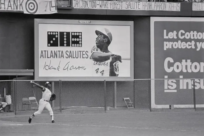 Framed Print : Hank Aaron Under Sign Saluting His Home Runs Framed Print : Hank Aaron Under Sign Saluting His Home Runs