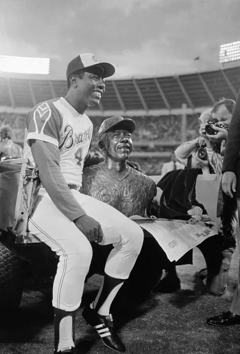 Framed Print : Hank Aaron Sitting with Sculpture Bust of Himself Framed Print : Hank Aaron Sitting with Sculpture Bust of Himself