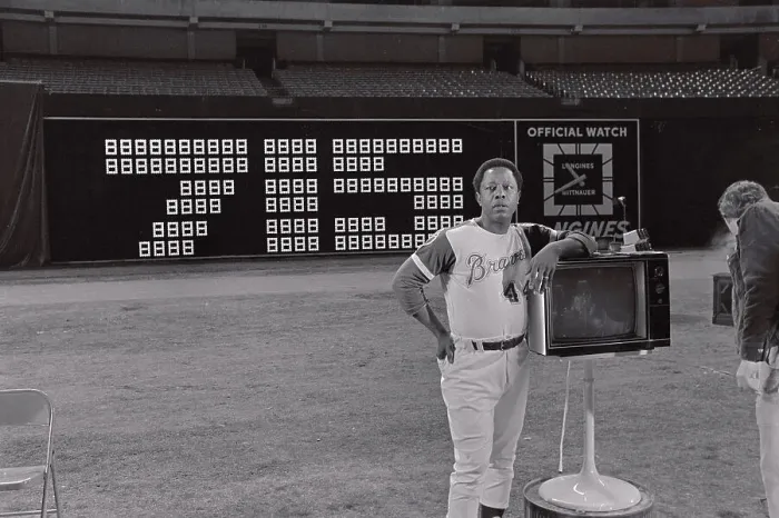 Framed Print : Hank Aaron Standing Next to Television Framed Print : Hank Aaron Standing Next to Television