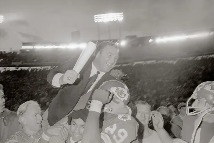 Framed Print : Hank Stram Being Carried on Top of Otis Taylor Framed Print : Hank Stram Being Carried on Top of Otis Taylor