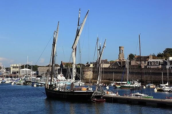 At the harbour of Concarneau, part of the city wall of the Ville close, Brittany, France