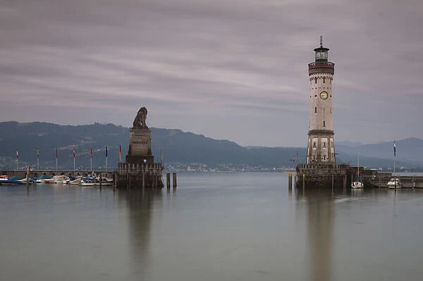 Harbour entrance of Lindau on Lake Constance with the old lighthouse and the Bavarian lion statue, Bavaria, Germany, Europe