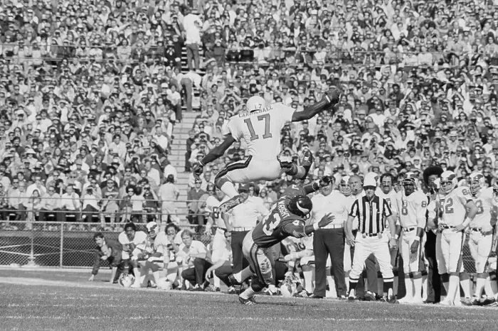 Framed Print : Harold Carmichael Leaping over Nate Wright Framed Print : Harold Carmichael Leaping over Nate Wright