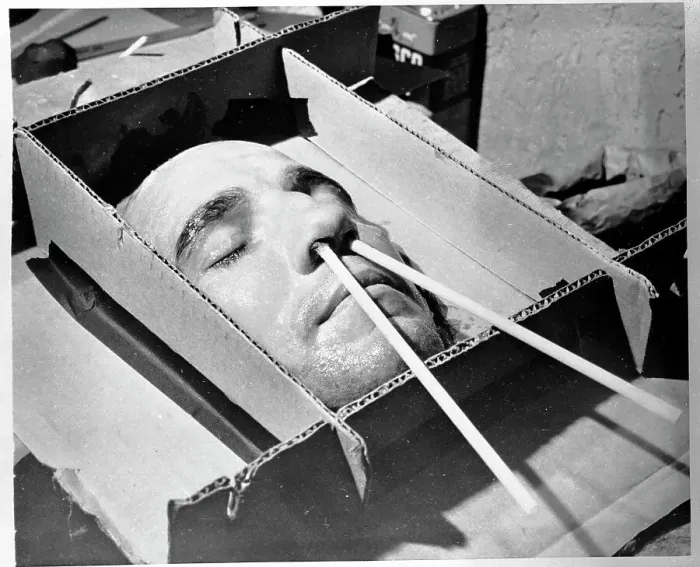 Framed Print : Harold Tasker Posing for a Plaster Mask Framed Print : Harold Tasker Posing for a Plaster Mask