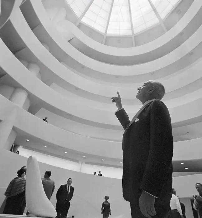 Framed Print : Harry F. Guggenheim Pointing to Interior of Museum Dome